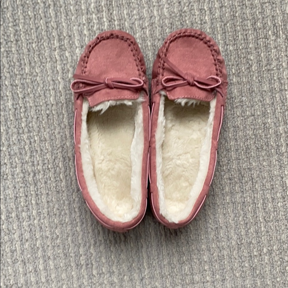Pink fuzzy slippers